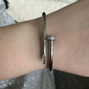 Stainless steel nail cuff with crystal accents!